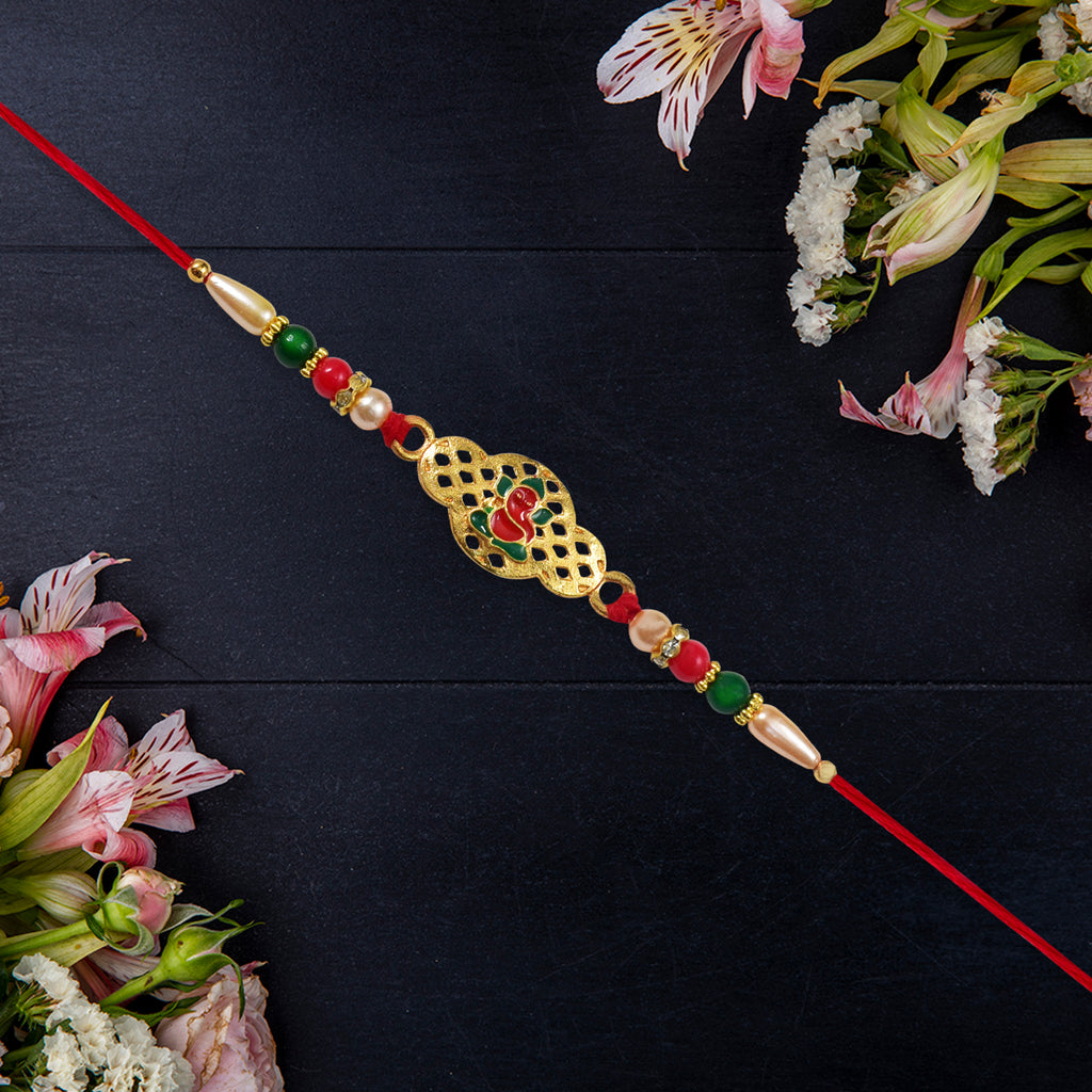 Religious Ganesha Rakhi In Gold Finish